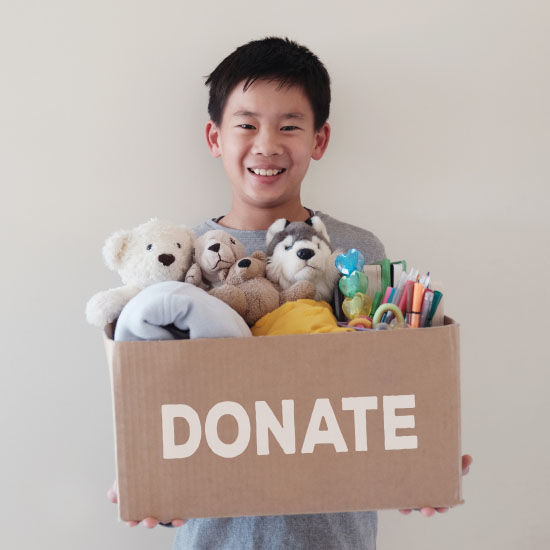 A kid with donation box